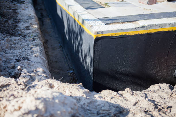 Professional Interior Drainage System technician working in Northfield, KY